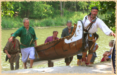 voyageurs portaging a canoe
